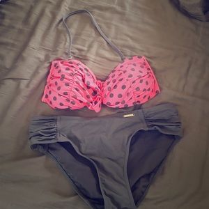 Two piece polka dot bikini.