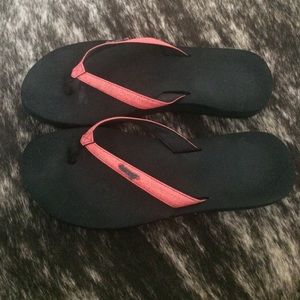 Reef flip flops with about a 1" thick sole