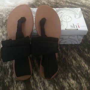 Black with tan sole, sling sandal flats