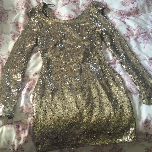 I am selling a glittered fitted dress