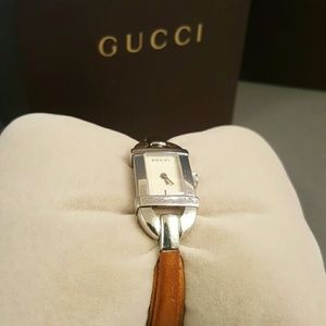 Gucci woman's 6800l watch w/ tan wrist band