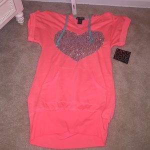 Bright orange hoodie with sequence