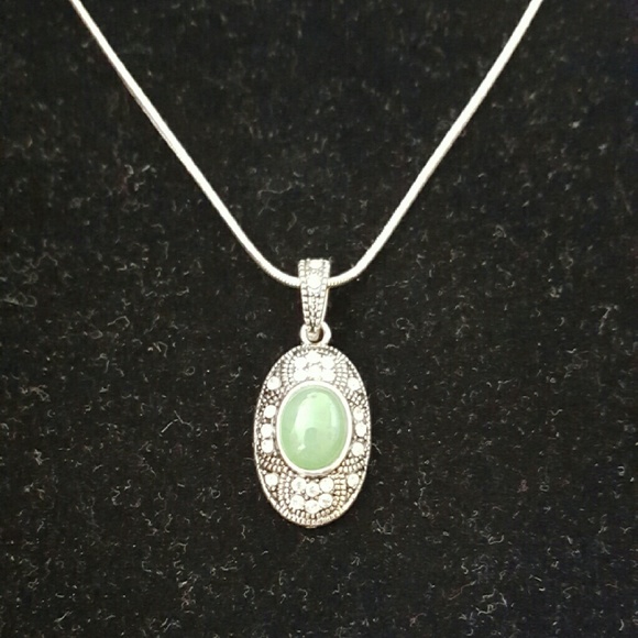 Necklace with jade colored stone