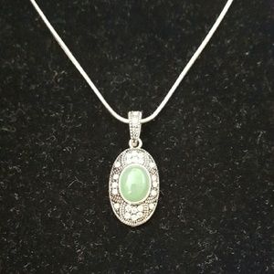 Necklace with jade colored stone