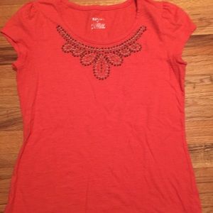 Swoop neck tee with bead detail. Coral color