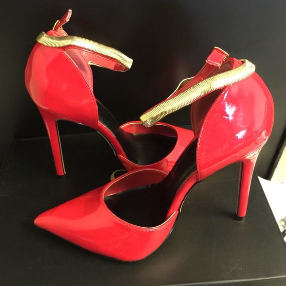 Red Heels with snake embellishments