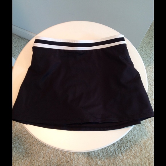 New no tags black nylon/spandex swim skort  10