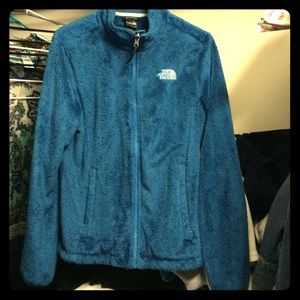 It's blue with white writing. It's a large