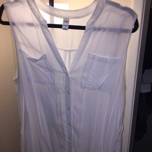 White sleeveless button up