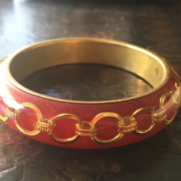 Adorable red lucite bangle with gold chain detail