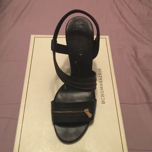 BCBG black heels with gold zipper accents