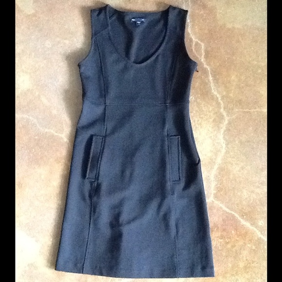Black sleeveless form fitting dress