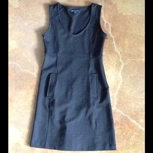 Black sleeveless form fitting dress