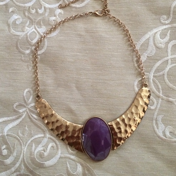 Gold hammered necklace with purple stone