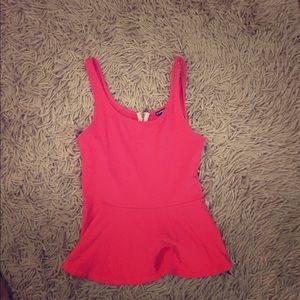 Coral peplum tank
