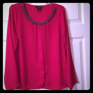 Red jeweled blouse