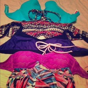Bathing suit tops and one matching Set.