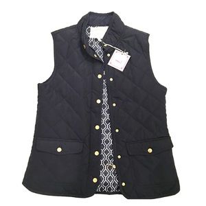 Brand new navy puffy vest. Small. New with tags.