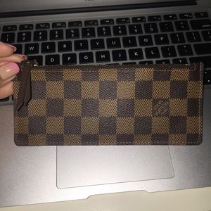 Sold. Louis Vuitton zip pouch