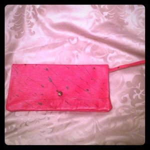Funky red leather clutch