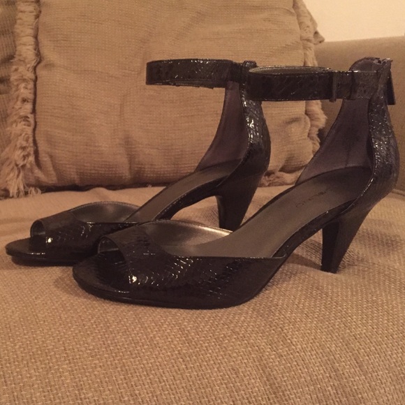 Black heels with zipper back and ankle straps