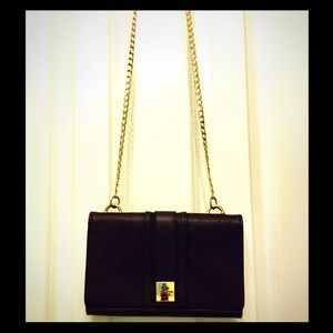 Hipster style black and gold purse