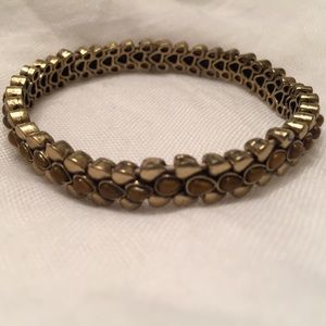Fossil gold tone bracelet w/ brown stone detail