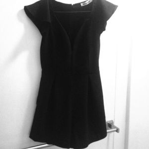 Black romper with front plunge