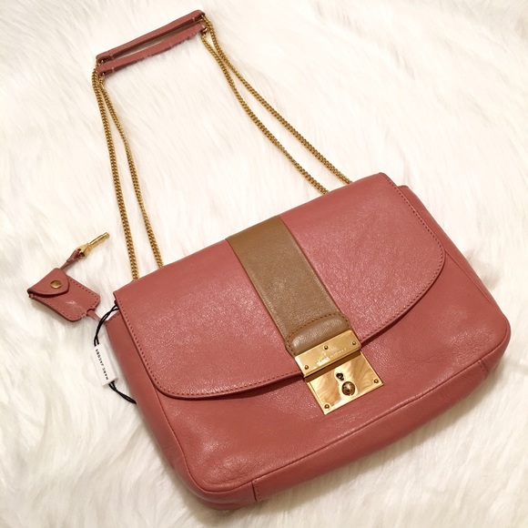 Marc Jacobs Handbags - NWT Marc Jacobs Mini Polly Leather Shoulder Bag!