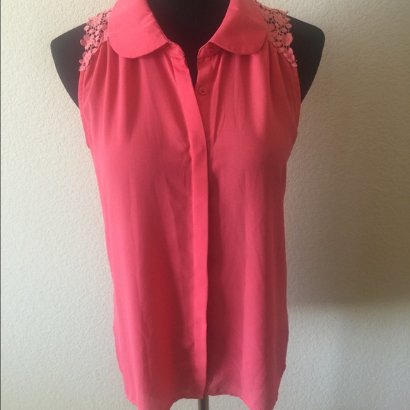 Coral lace button up shirt.