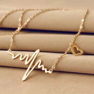 Gold Heartbeat Necklace with Heart Charm