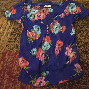 Bright blue shirt sleeve shirt with flowers