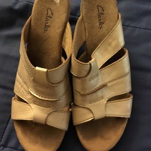 Gold tone Clarks wedges