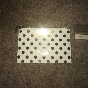 Kate Spade pencil case. White and gold polka dots!