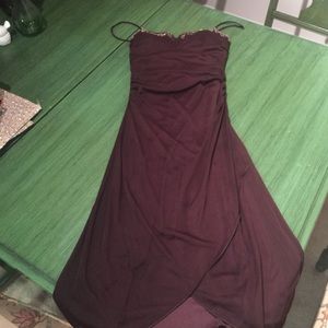 Brown knee length dress.
