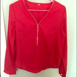 Bright red, long sleeve zipper top