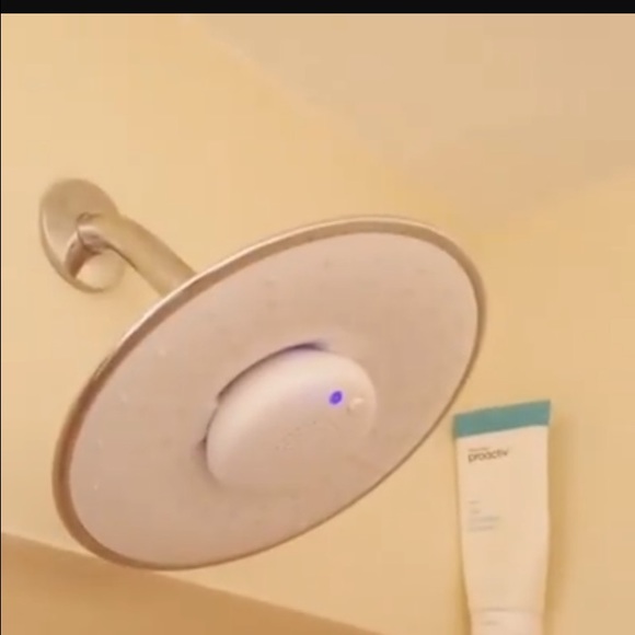 Shower head with built in Bluetooth speaker