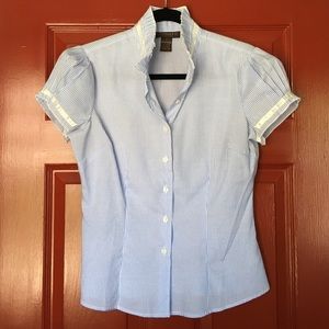 Light blue and white butting down shirt