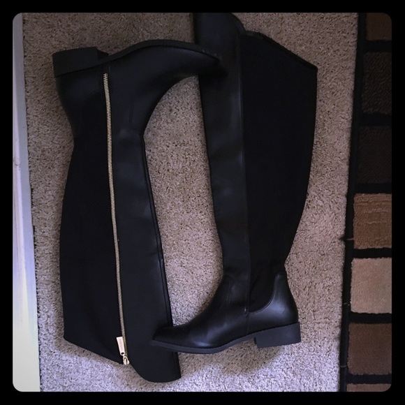 High legged boots By:Christian Sirano