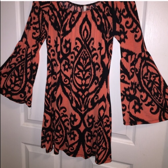 Boutique belle sleeved orange and black dress.
