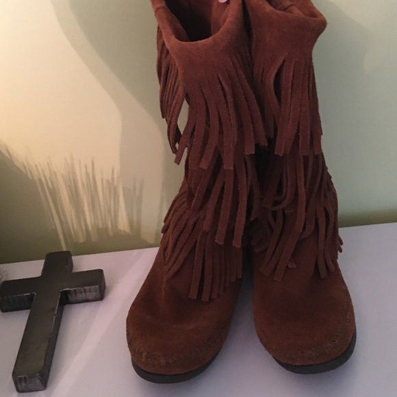Brown fringed moccasins