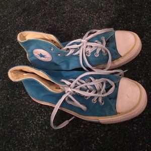 Blue and green fuzzy converse