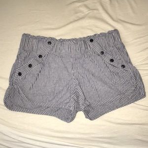 Gray and white striped fabric shorts