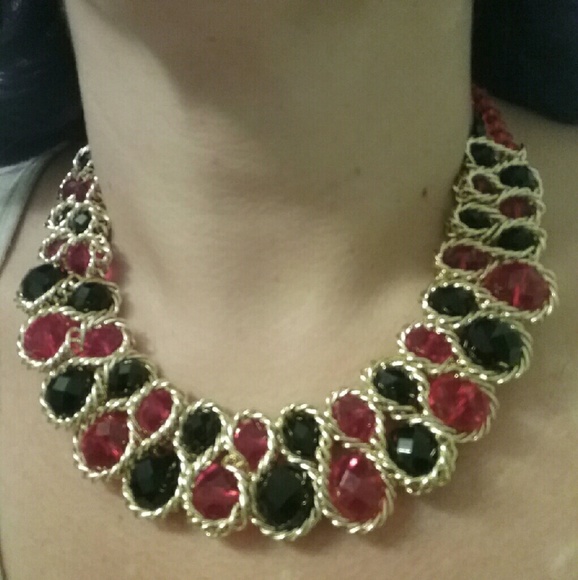 Gold with red and black stone choker the