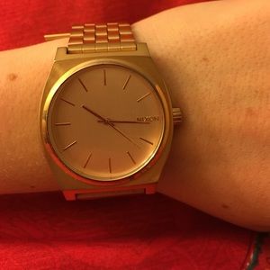 Nixon time teller rose gold watch