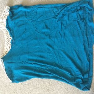 Blue shirt with lace shoulders