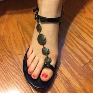 Black wedge sandals.