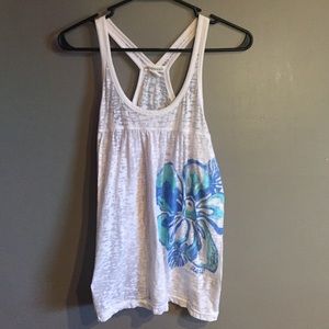 White tank top with blue flower