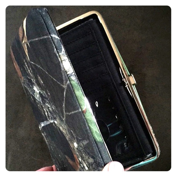 Camo wallet with removable checkbook cover.