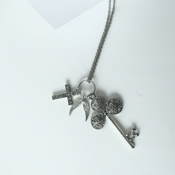 Cross heart & wing necklace